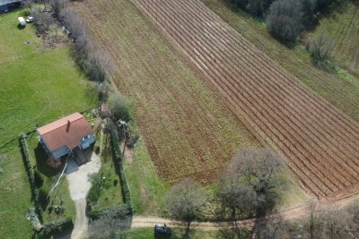 Poreč, okolica, działka budowlana z przeznaczeniem rolnym w spokojnej lokalizacji, 12 km od morza